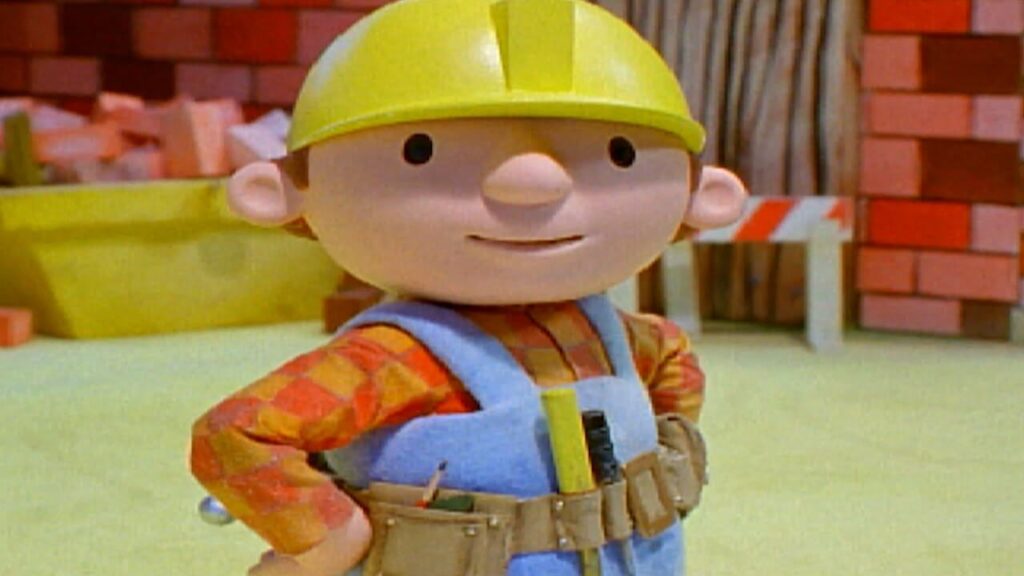 bob the builder in his yellow construction helmet and orange shirt