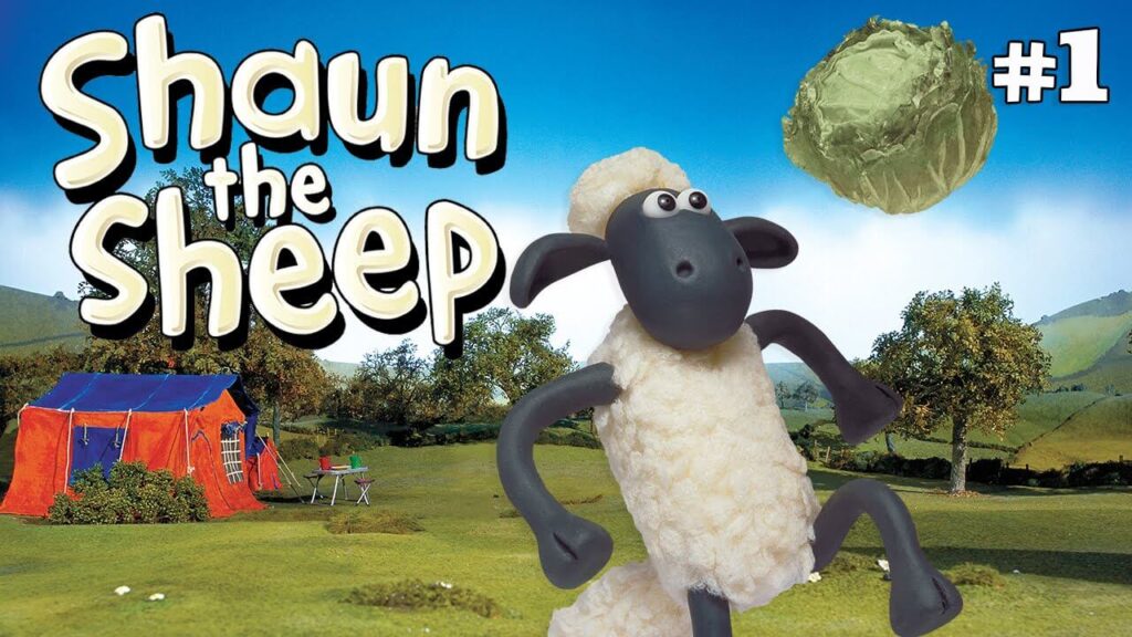 shaun the sheep playing with a cabbage